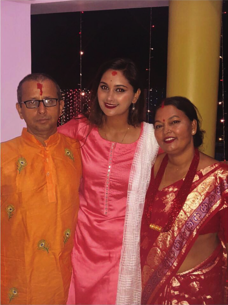 Reshma Ghimire with her parents
